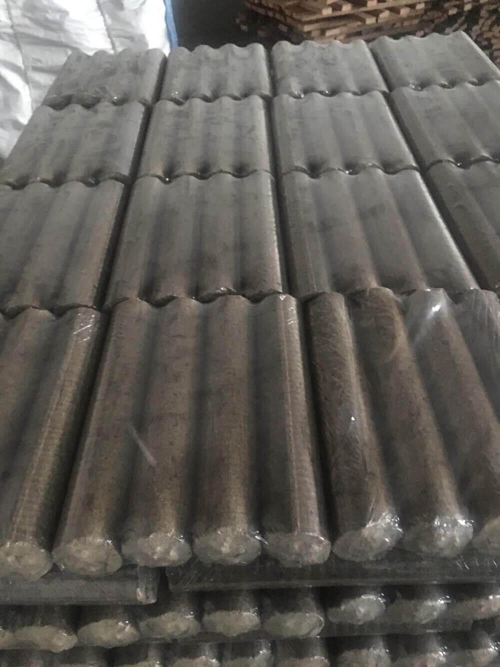 Finished sawdust briquettes at Mihail Kogalniceanu