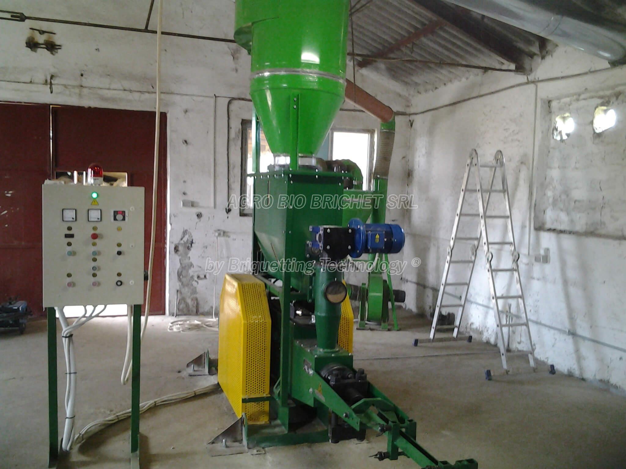 Briquetting machine in operation